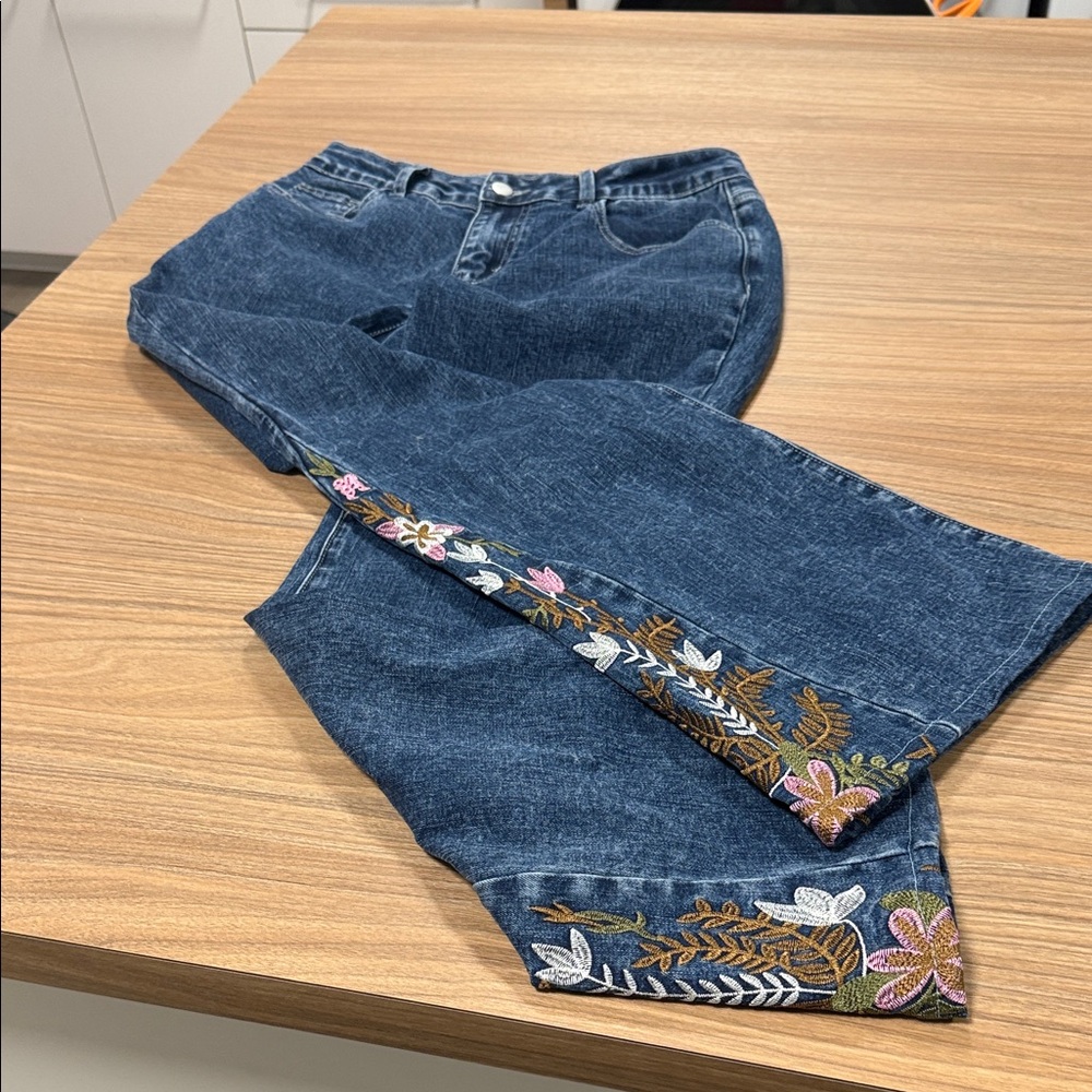 medium size blue jeans with embroidery side inserts